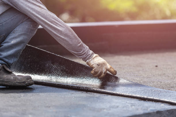 Professional Basement Waterproofing technician working in Lincoln, ID